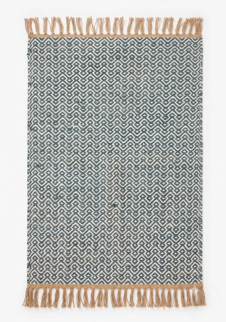 blue cotton jute rug in a white background