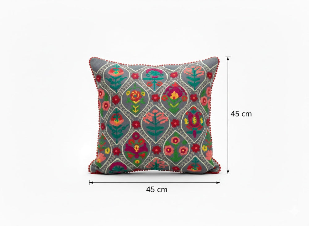 Decorative pillow with floral patterns and measurements on a white background