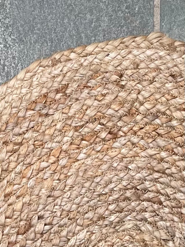 Close up of Heart Jute Braided Rug - Second Nature Online